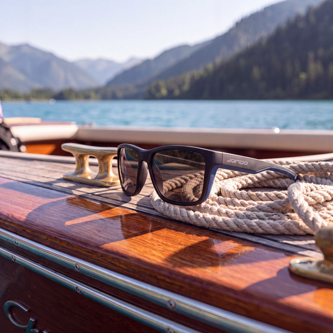 JONDO sunglasses on a boat beside a lake